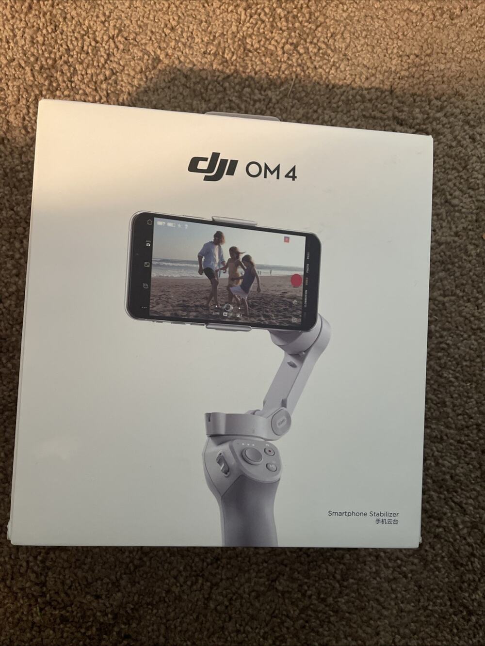 DJI OM4 3-Axis Gimbal Stabilizer / Tripod for Smartphones New